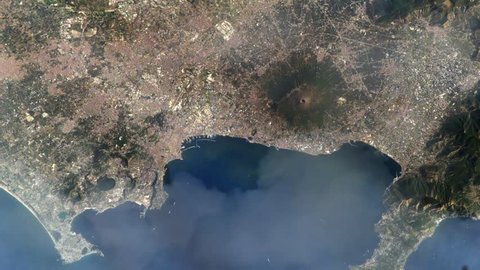 Mt. Vesuvius and Naples, in Italy, Seen from From the International Space Station. Elements of this image furnished by NASA.