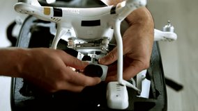 Preparing Drone For Flying. Aero Videography Quadcopter Photography. Drone Operator.  
Aerial Photographer. Launching Quadcopter Drone Prepare To Take Off. Video Shooting. Drone Operator Launch Copter