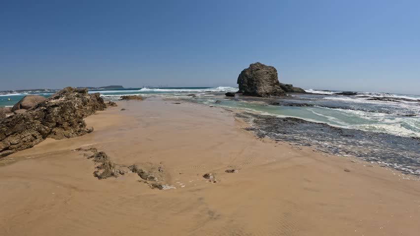 Currumbin Rock On Sandy Beach Of Currumbin Alley In Gold Coast, Queensland. wide shot