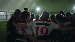 School Girls Playing Football In Stadium, Girls Players Standing In Round And Hugging Before Match - Powered by Shutterstock - Get 15% off with code: PIKWIZARD15