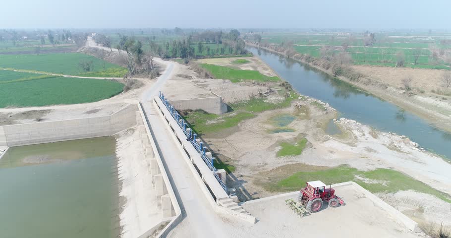 Aerial View With Drone. Beautiful view of Layyah Pakistan village canal Bridge. Beautiful bridge Footage. 4K Footage. Royalty-Free Stock Footage #3442211265