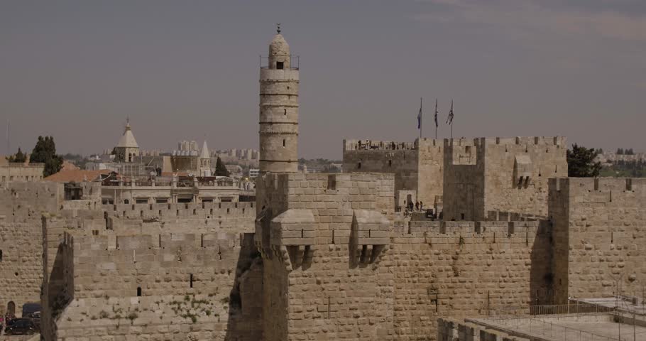 Aerial Footage of the Tower of David, the walls of the Old City and the Old City of Jerusalem.