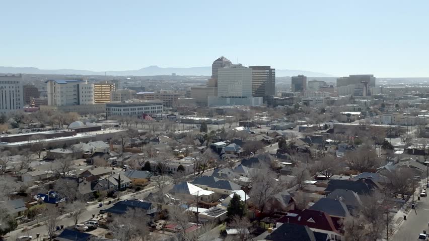 Downtown Albuquerque, New Mexico with wide show drone video moving sideways.