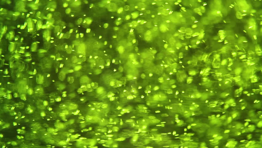 Bubbles in green glass of beer close up macro. Royalty-Free Stock Footage #34423228