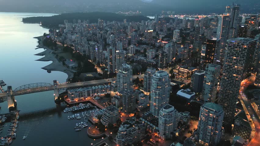 Aerial view on downtown of Vancouver at night, Granville bridge and False Creek