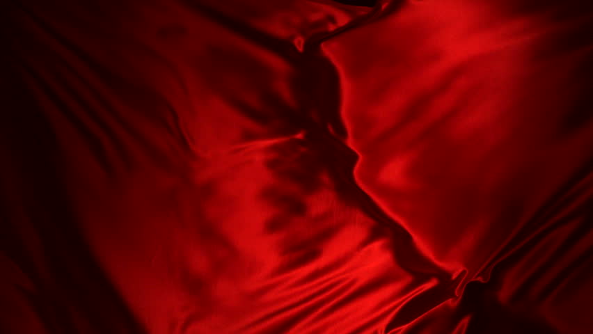 Red silk fabric flying in the air shooting with high speed camera, phantom flex.