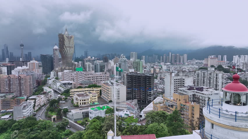 Macau Flag On The Background Of The Panorama Of The City, Aerial View