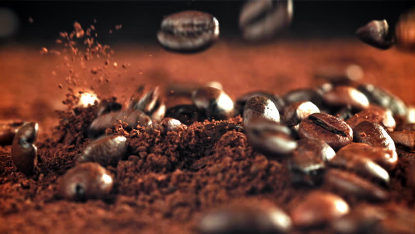 The beans fall into the ground coffee. Filmed on a high-speed camera at 1000 fps. High quality FullHD footage Royalty-Free Stock Footage #3442572533