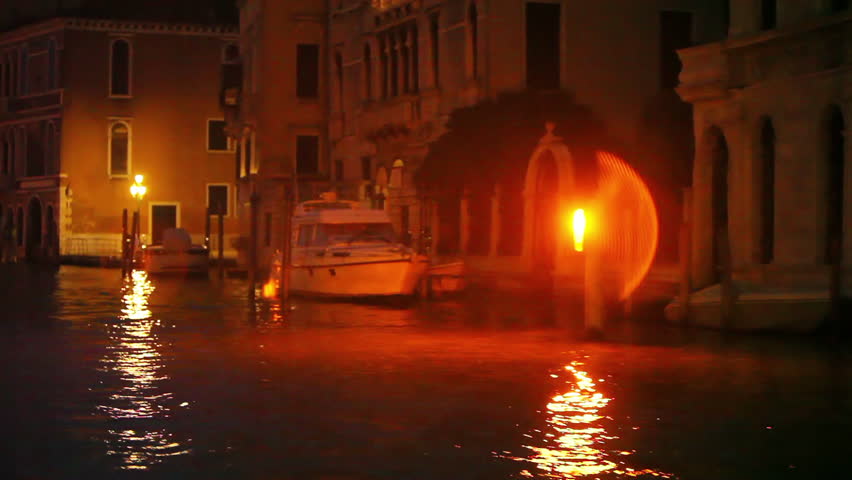View of a Venice canal from a boat at Night