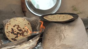 Rural Vintage Kitchen using firewood in-earthen chulhas for cooking food. - Powered by Shutterstock - Get 15% off with code: PIKWIZARD15