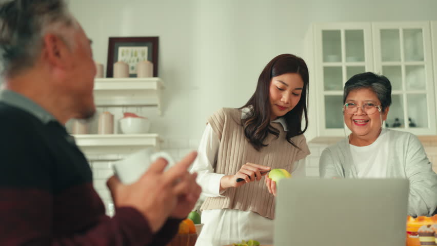 mother day family relation bonding at home asian family mother father and daughter enjoy cuddle conversation morning lifestyle hapiness joyful moment while stay at kitchen area home love bonding