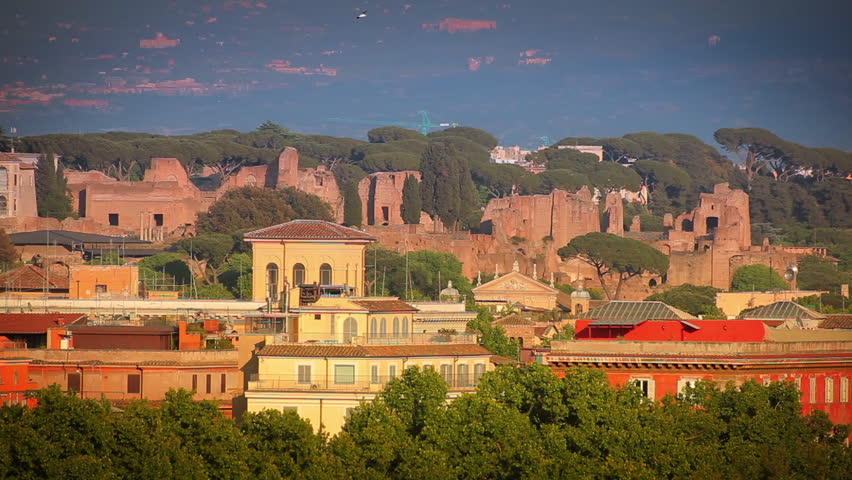 Stationary shot of Roman cityscape with an abundance of trees and vegitation