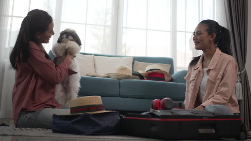 Pretty women prepare suitcase for travel. travel and lifestyle.