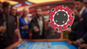 Multiethnic Young Adults Playing an Engaging Game of Roulette, Spending a Fun Evening in a Fancy Hotel Casino. Enthusiastic Gambler Tossing a Red Casino Chip with a Template Placeholder - Powered by Shutterstock - Get 15% off with code: PIKWIZARD15