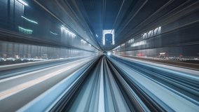 Motion timelapse POV shot from automated train at night in Tokyo, Japan. - Powered by Shutterstock - Get 15% off with code: PIKWIZARD15