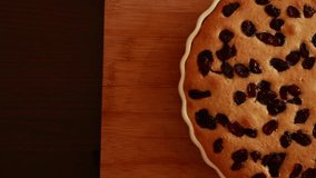  bake tea cake - effortless pear  cranberry delight close-up on wooden board