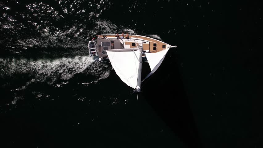 Sailboat in canada with full sails