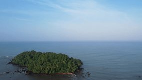 Dharmadam beach aerial drone footage, beautiful green island surrounded with blue water, Kerala travel and tourism video