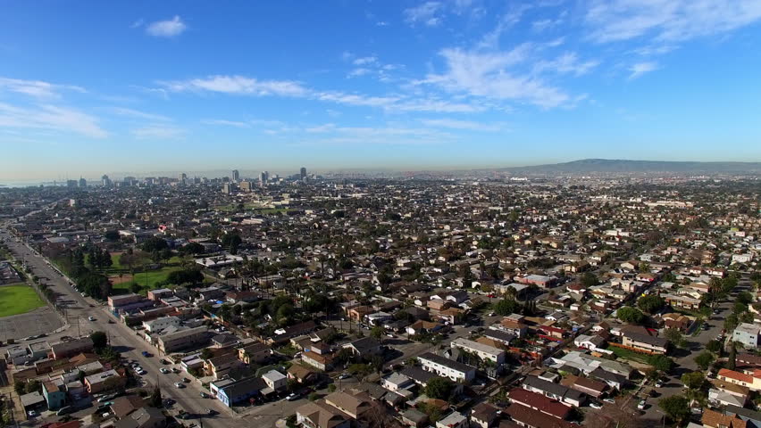 Aerial Time Lapse Lockdown Scenic View Of Houses In City Under Sky On Sunny Day - Long Beach, California