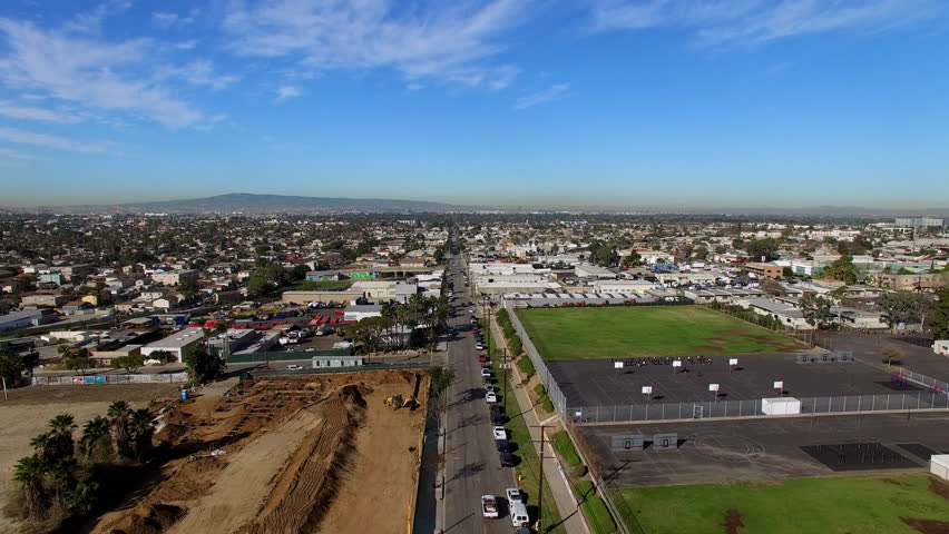 Aerial Forward Beautiful View Of Residential City Landscape On Sunny Day - Long Beach, California