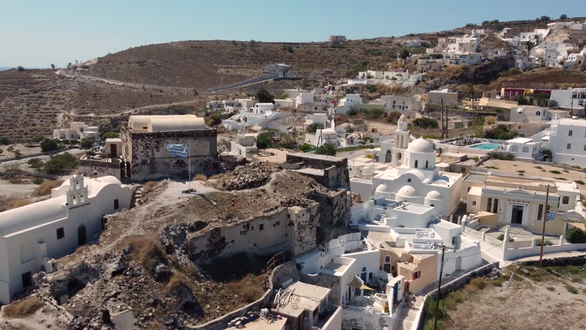Castle of Akrotiri with Greece Flag and Akrotiri Village, Santorini Royalty-Free Stock Footage #3443034507