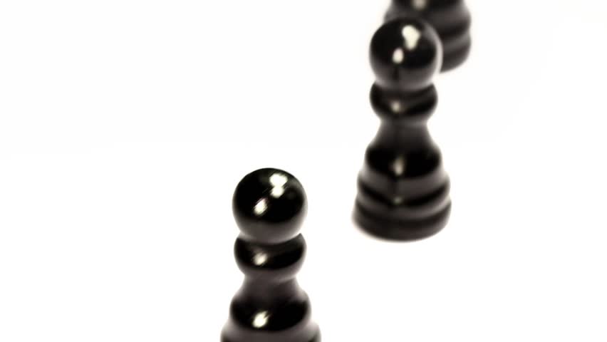 Chess set's march. Seamless, loop. Black chess pieces crossing in a row. 
