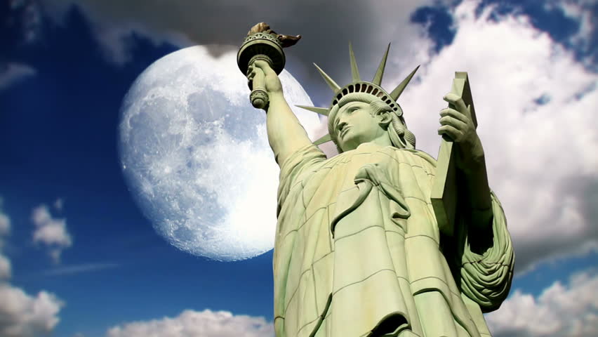 A stylized time lapse shot of The Statue of Liberty with the full moon
