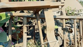 Abandoned white car with damaged paint and broken windows overgrown with vegetation depicting neglect and decay old accident scrap car asia india - Powered by Shutterstock - Get 15% off with code: PIKWIZARD15