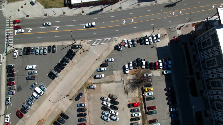 Aerial: Drone Tilt Up Shot Of Famous Baseball Stadium In Modern City Against Clear Sky On Sunny Day - Charlotte, North Carolina