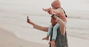 Smartphone, video and father with child at beach for bonding, vlog or social media post with piggyback. Happy, man and daughter by ocean with technology for vacation, holiday or memory together