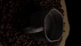 Close up of a cup of coffee with background of rotating coffee beans. Vertical video