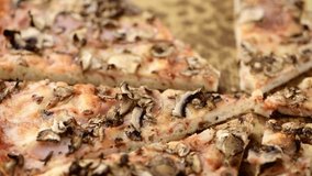Fresh made Mushroom Pizza rotating on a plate (seamless loopable; 4K)