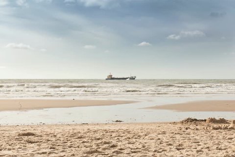 Holland-The Netherlands-Texel island-Time lapse
On the beach a ships trail-beach scene