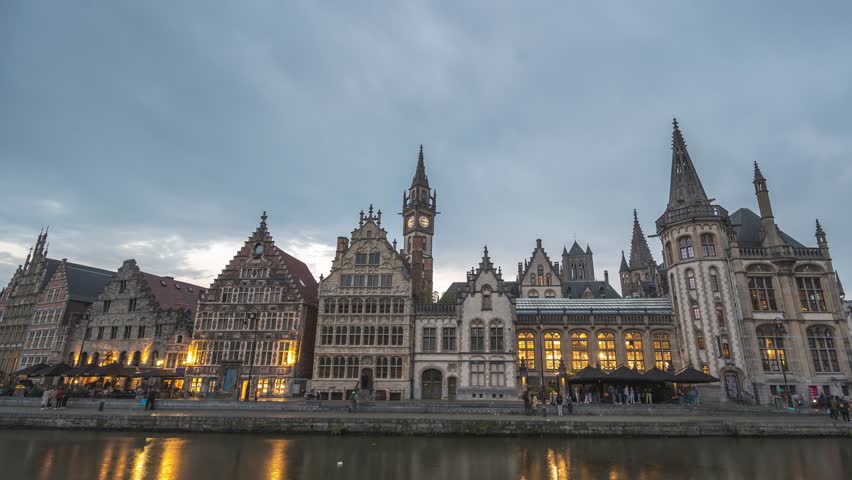 Ghent Belgium time lapse, city skyline day to night at St Michael