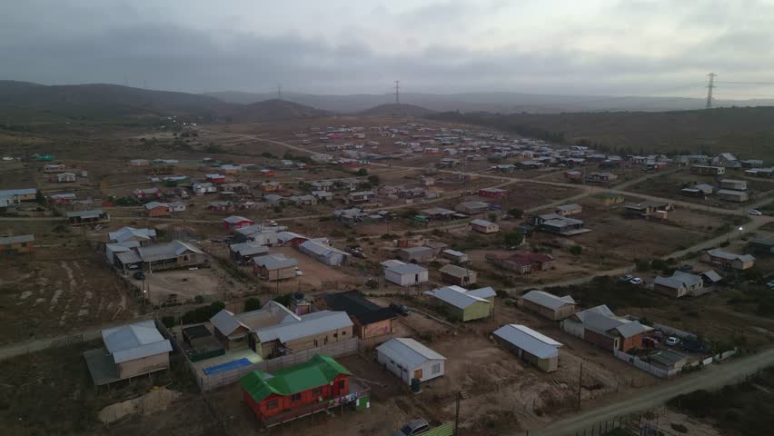 wooden houses, on the slope of a hill in the metropolitan region, country of Chile