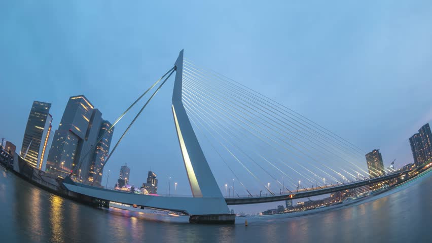Rotterdam Netherlands time lapse, city skyline day to night at Erasmus Bridge
