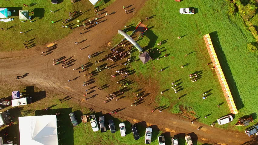 Aerial Top Downward Shot Of Men And Women Gathered For Marathon On Oahu Island During Sunny Day - Honolulu, Hawaii