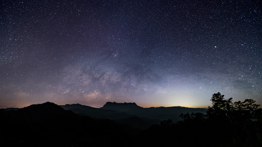 Milkyway raising in the night sky behind Doi Luang Chiang Dao in Chiang Mai, Thailand