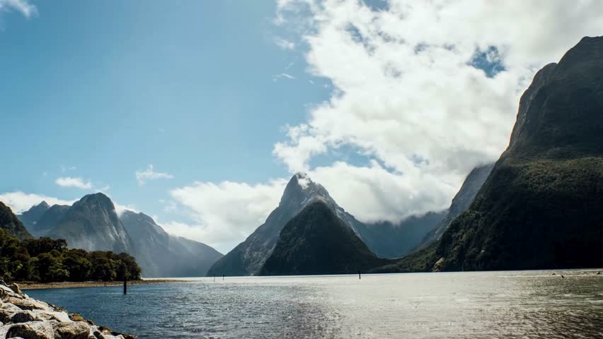 Discover Milford Sound: a pristine fjord nestled in Fiordland National Park. Towering cliffs, cascading waterfalls, and lush rainforests await.



 Royalty-Free Stock Footage #3444107363