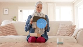 Animation of globe with network of connections over biracial woman in hijab using tablet. Global data processing, computing and digital interface concept digitally generated video.