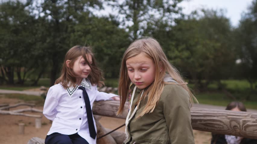 portrait of a little beautiful child girl in the park
