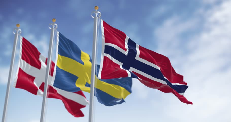 National flags of Norway, Sweden and Denmark waving in the wind on a clear day. European nordic countries. Seamless 3d render animation. Slow motion loop. Selective focus