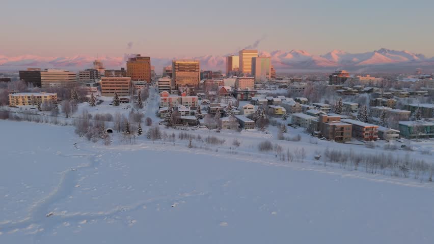 Aerial Anchorage biggest city in Alaska US state covered in snow in winter