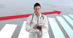 Animation of financial data processing over biracial female doctor using tablet. Global medicine, business, computing and data processing concept digitally generated video.