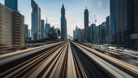 Motion timelapse POV shot from modern Dubai Elevated Metro System running alongside the Sheikh Zayed Road in Dubai, United Arab Emirates (UAE). - Powered by Shutterstock - Get 15% off with code: PIKWIZARD15