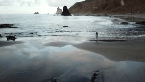 video of waves lapping a rocky shore in Tenerife