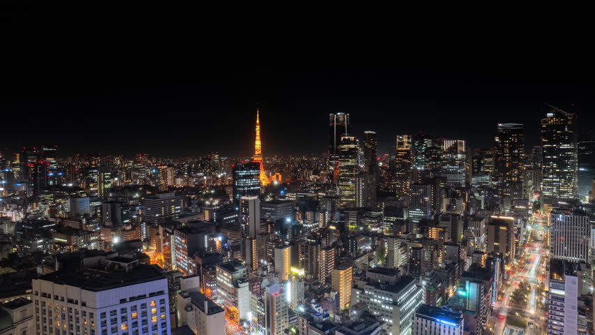 tokyo city downtown aerial view timelapse from night to day minato ward district,high point of view time lapse of modern urban town business buildings and skyscrapers