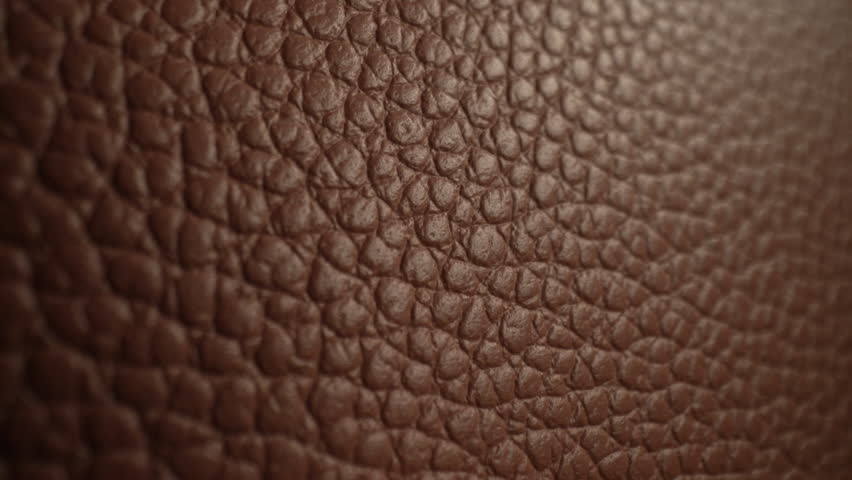Brown soft pattern surface of luxury leather. Animal skin material, handmade.