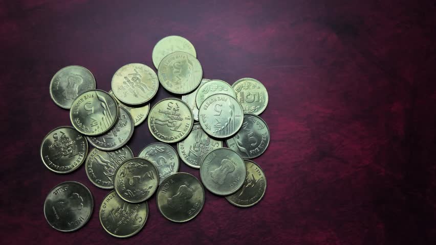 Indian Currency -  5 Rupee Coins - Leftwards Shot. Royalty-Free Stock Footage #3444826147