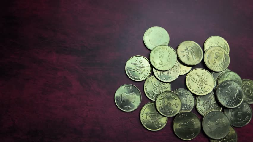 Indian Currency -  5 Rupee Coins - Rightwards Shot. Royalty-Free Stock Footage #3444826551
